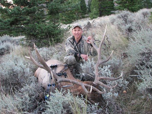 Three happy elk hunters